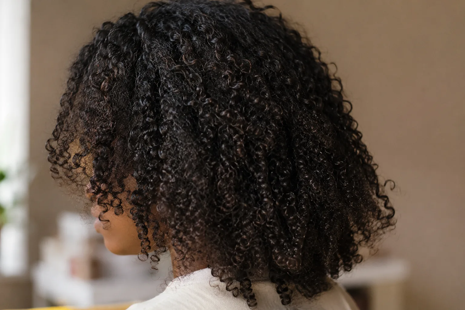 Close-up of curly and coily natural hair textures